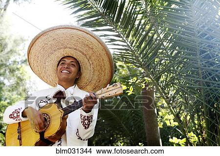 Picture - Musician playing in mariachi band, San Miguel de Allende, Guanajuato, Mexico. Fotosearch