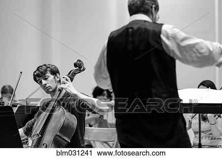 Professor conducting college orchestra View Large Photo Image Stock Image - Professor conducting college orchestra. Fotosearch