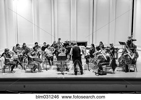 Students playing in college orchestra View Large Photo Image Stock Photograph - Students playing in college orchestra. Fotosearch