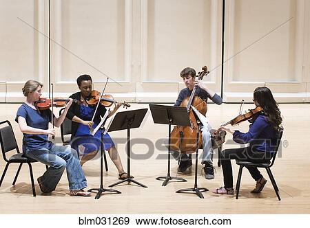 Stock Photo - Students playing in college string quartet. Fotosearch