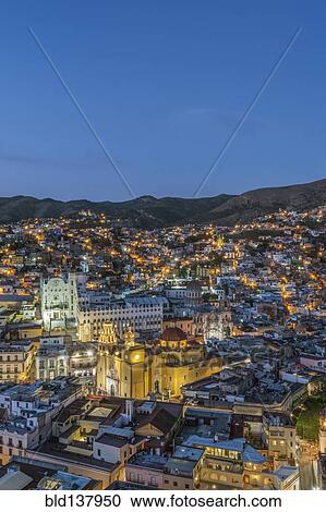 Stock Image - Aerial view of Guanajuato cityscape lit up at night, Guanajuato, Mexico. Fotosearch