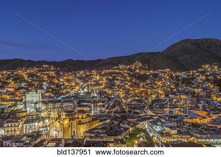 Stock Image - Aerial view of Guanajuato cityscape lit up at night, Guanajuato, Mexico. Fotosearch