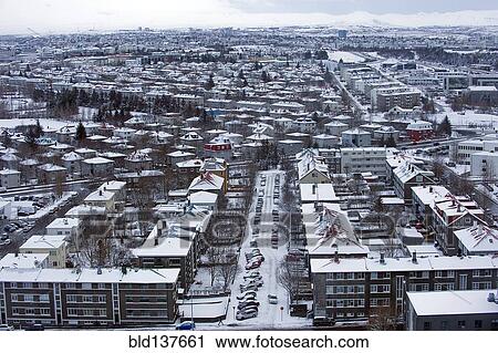 Stock Image - Aerial view of snowy cityscape, Reykjavik, Hofudborgarsvaedi, Iceland. Fotosearch