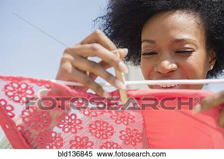 African American woman hanging laundry on clothesline View Large Photo Image Stock Photography - African American woman hanging laundry on clothesline. Fotosearch