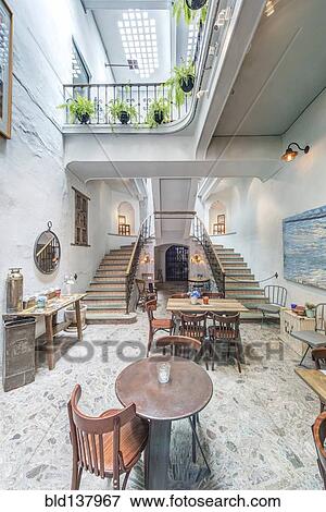 Balcony and staircase in traditional coffee shop View Large Photo Image Stock Photo - Balcony and staircase in traditional coffee shop. Fotosearch