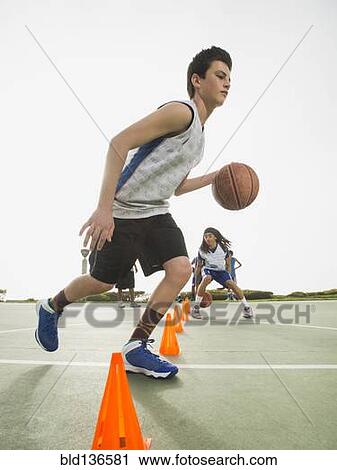 Basketball team doing drills at practice View Large Photo Image Stock Image - Basketball team doing drills at practice. Fotosearch