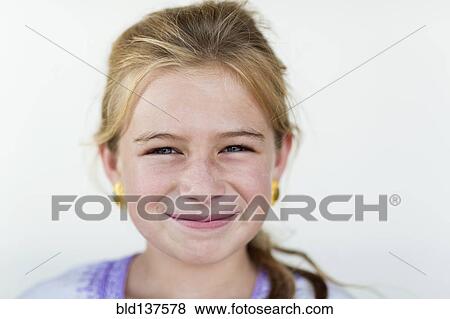 Stock Photo - Caucasian girl smiling. Fotosearch