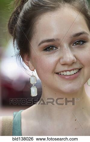Stock Photograph - Caucasian woman smiling outdoors. Fotosearch
