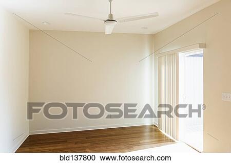 Ceiling fan over empty room View Large Photo Image Stock Image - Ceiling fan over empty room. Fotosearch
