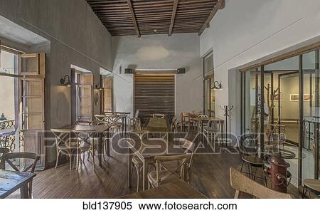 Stock Photography - Chairs and tables in traditional coffee shop, Guanajuato, Guanajuato, Mexico. Fotosearch