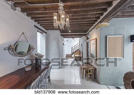 Chandelier and benches in modern hallway View Large Photo Image Stock Photo - Chandelier and benches in modern hallway. Fotosearch