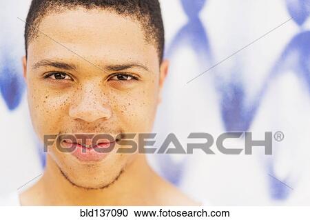 Close up of African American man smiling View Large Photo Image Stock Image - Close up of African American man smiling. Fotosearch