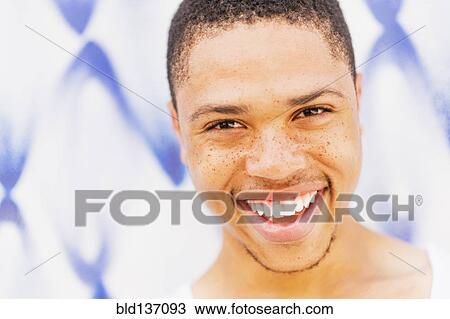 Close up of African American man smiling View Large Photo Image Stock Image - Close up of African American man smiling. Fotosearch