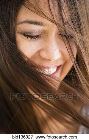 Close up of woman smiling View Large Photo Image Stock Photo - Close up of woman smiling. Fotosearch