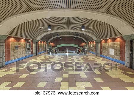 Stock Image - Curved roof and floor tiles of subway station. Fotosearch