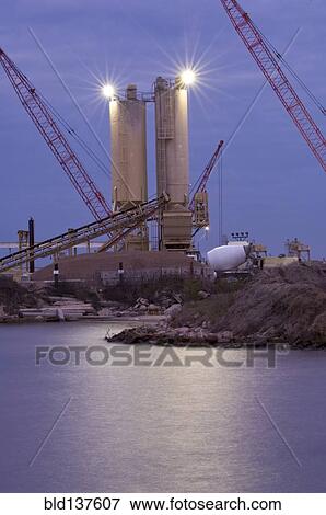Stock Photo - Factory overlooking lake. Fotosearch