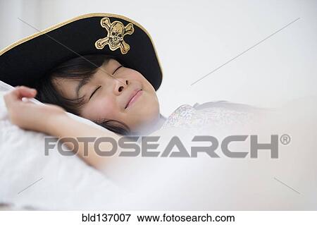 Filipino girl sleeping in dress-up costume View Large Photo Image Stock Photo - Filipino girl sleeping in dress-up costume. Fotosearch