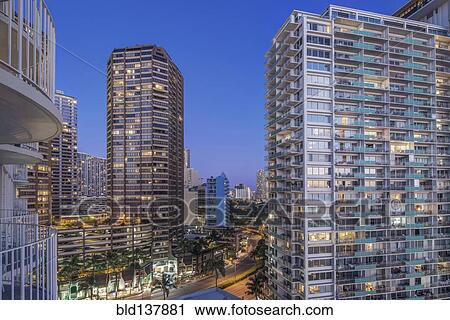 Illuminated skyscrapers in cityscape, Honolulu, Hawaii, United States View Large Photo Image Stock Image - Illuminated skyscrapers in cityscape, Honolulu, Hawaii, United States. Fotosearch