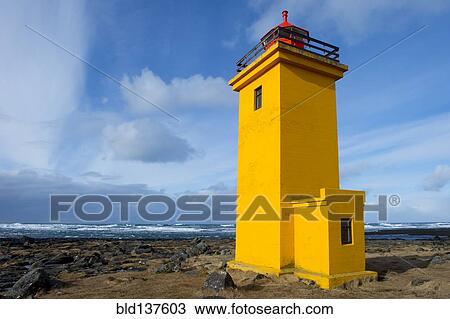 Lighthouse overlooking rocky beach View Large Photo Image Stock Image - Lighthouse overlooking rocky beach. Fotosearch