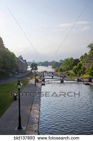 Locks in Rideau Canal under blue sky, Ottawa, Ontario, Canada View Large Photo Image Stock Image - Locks in Rideau Canal under blue sky, Ottawa, Ontario, Canada. Fotosearch