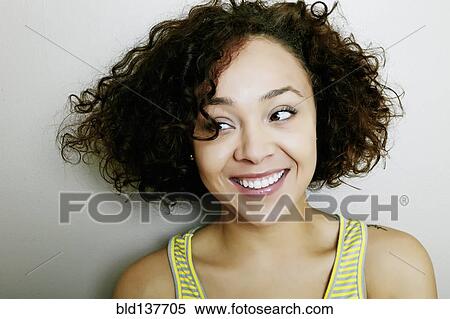 Mixed race woman smiling View Large Photo Image Stock Photography - Mixed race woman smiling. Fotosearch