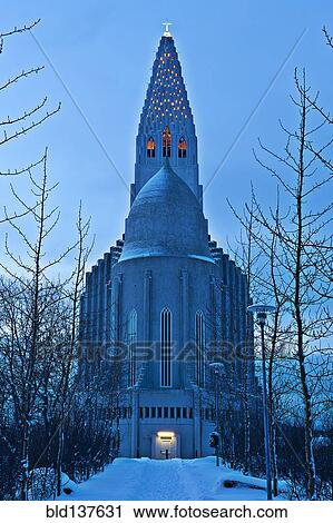 Stock Image - Monument overlooking snowy courtyard, Reykjavik, Hofudborgarsvaedi, Iceland. Fotosearch