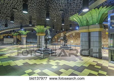 Stock Photo - Ornate pillars and movie reels on ceiling in subway station, Los Angeles, California, United States. Fotosearch