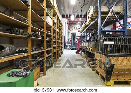 Shelves, tools and aisles in warehouse View Large Photo Image Stock Image - Shelves, tools and aisles in warehouse. Fotosearch
