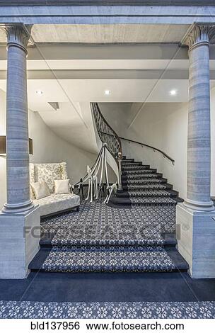 Stock Photograph - Staircase and carpet in ornate hotel lobby. Fotosearch