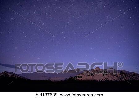 Starry sky over arctic landscape View Large Photo Image Stock Photo - Starry sky over arctic landscape. Fotosearch