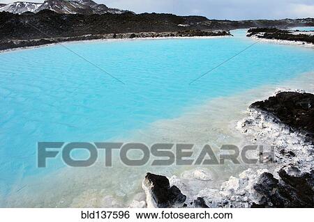 Stock Photograph - Still lake in arctic landscape. Fotosearch