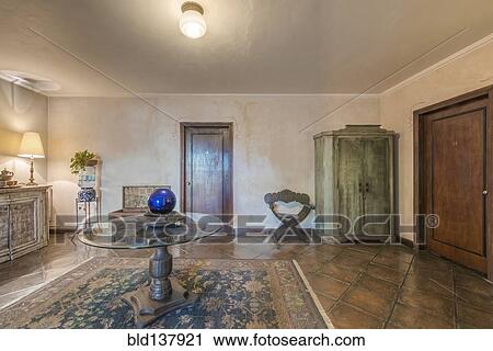 Table and rug in traditional hotel lobby View Large Photo Image Stock Image - Table and rug in traditional hotel lobby. Fotosearch