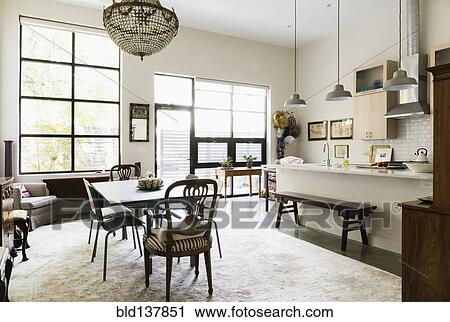 Windows, lighting and rug in dining room and kitchen area View Large Photo Image Stock Image - Windows, lighting and rug in dining room and kitchen area. Fotosearch
