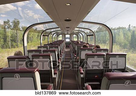 Stock Photo - Windows of tour bus in rural landscape. Fotosearch