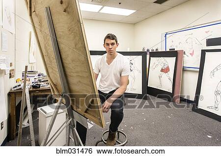 Caucasian artist working in studio View Large Photo Image Stock Photograph - Caucasian artist working in studio. Fotosearch