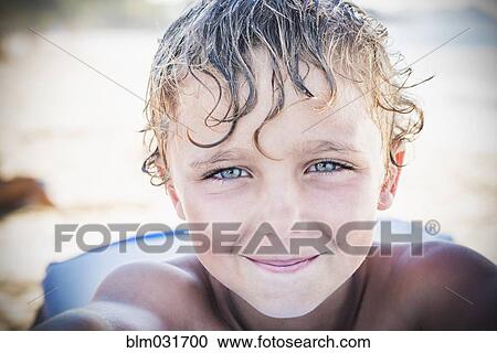 Stock Image - Caucasian boy smiling. Fotosearch