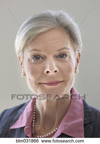 Caucasian businesswoman smiling View Large Photo Image Stock Photograph - Caucasian businesswoman smiling. Fotosearch