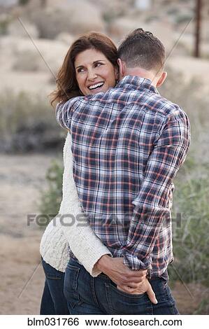 Caucasian couple walking outdoors View Large Photo Image Stock Photograph - Caucasian couple walking outdoors. Fotosearch