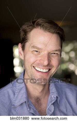 Stock Image - Caucasian man smiling. Fotosearch