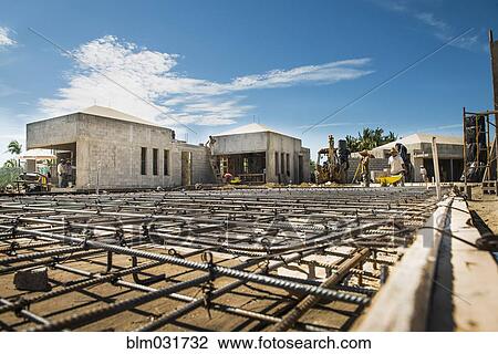 Stock Image - Hispanic construction worker at construction site. Fotosearch