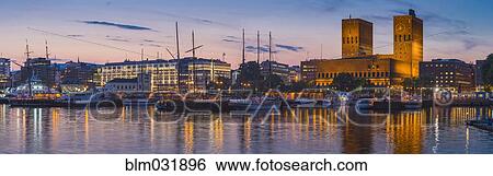 Panoramic view of Oslo harbor and city skyline at sunset, Ostlandet, Norway View Large Photo Image Stock Photograph - Panoramic view of Oslo harbor and city skyline at sunset, Ostlandet, Norway. Fotosearch