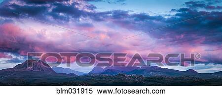 Panoramic view of pink clouds over remote landscape View Large Photo Image Stock Photography - Panoramic view of pink clouds over remote landscape. Fotosearch