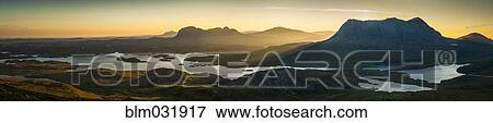 Stock Photo - Panoramic view of remote mountains and lakes, Ullapool, Scotland, United Kingdom. Fotosearch