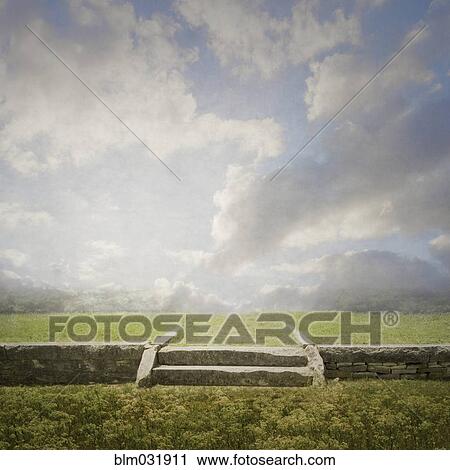 Rock wall and staircase under clouds in rural landscape View Large Photo Image Stock Image - Rock wall and staircase under clouds in rural landscape. Fotosearch