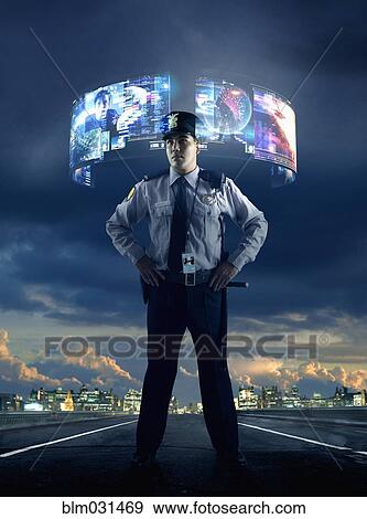 Stock Photo - Security guard watching virtual screens outdoors. Fotosearch