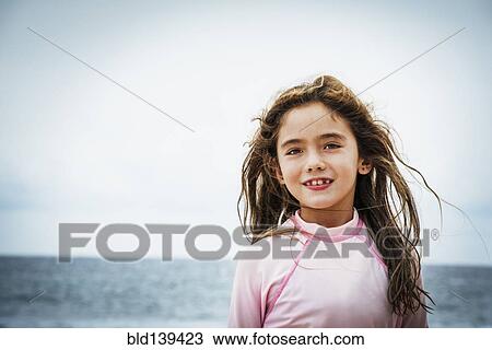 Asian girl near ocean View Large Photo Image Stock Image - Asian girl near ocean. Fotosearch