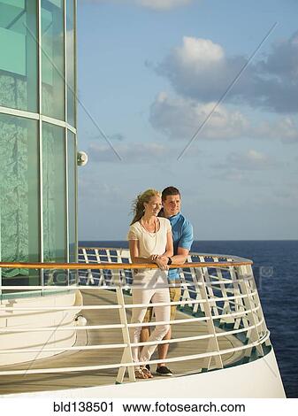 Caucasian couple admiring view from boat deck View Large Photo Image Stock Image - Caucasian couple admiring view from boat deck. Fotosearch