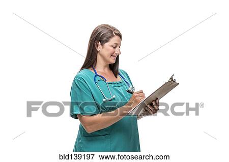 Caucasian nurse writing on clipboard View Large Photo Image Stock Photo - Caucasian nurse writing on clipboard. Fotosearch