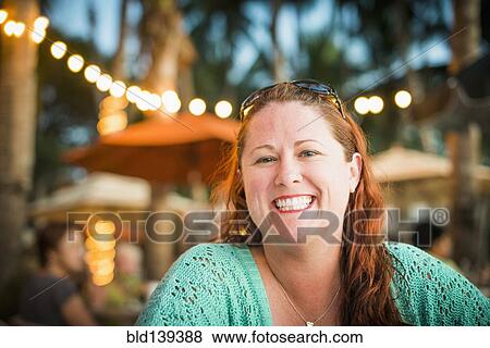 Caucasian woman smiling outdoors View Large Photo Image Stock Photo - Caucasian woman smiling outdoors. Fotosearch