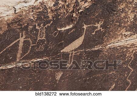 Stock Image - Close up of carving on rock, Petrified Forest National Park, Arizona, United States. Fotosearch